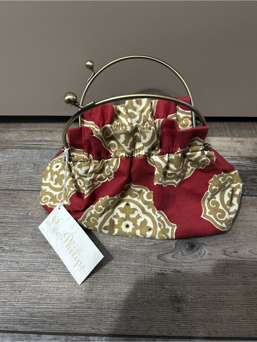 Lee Philips Red & Gold Patterned Frame-Top Women’s Clutch with bling embell